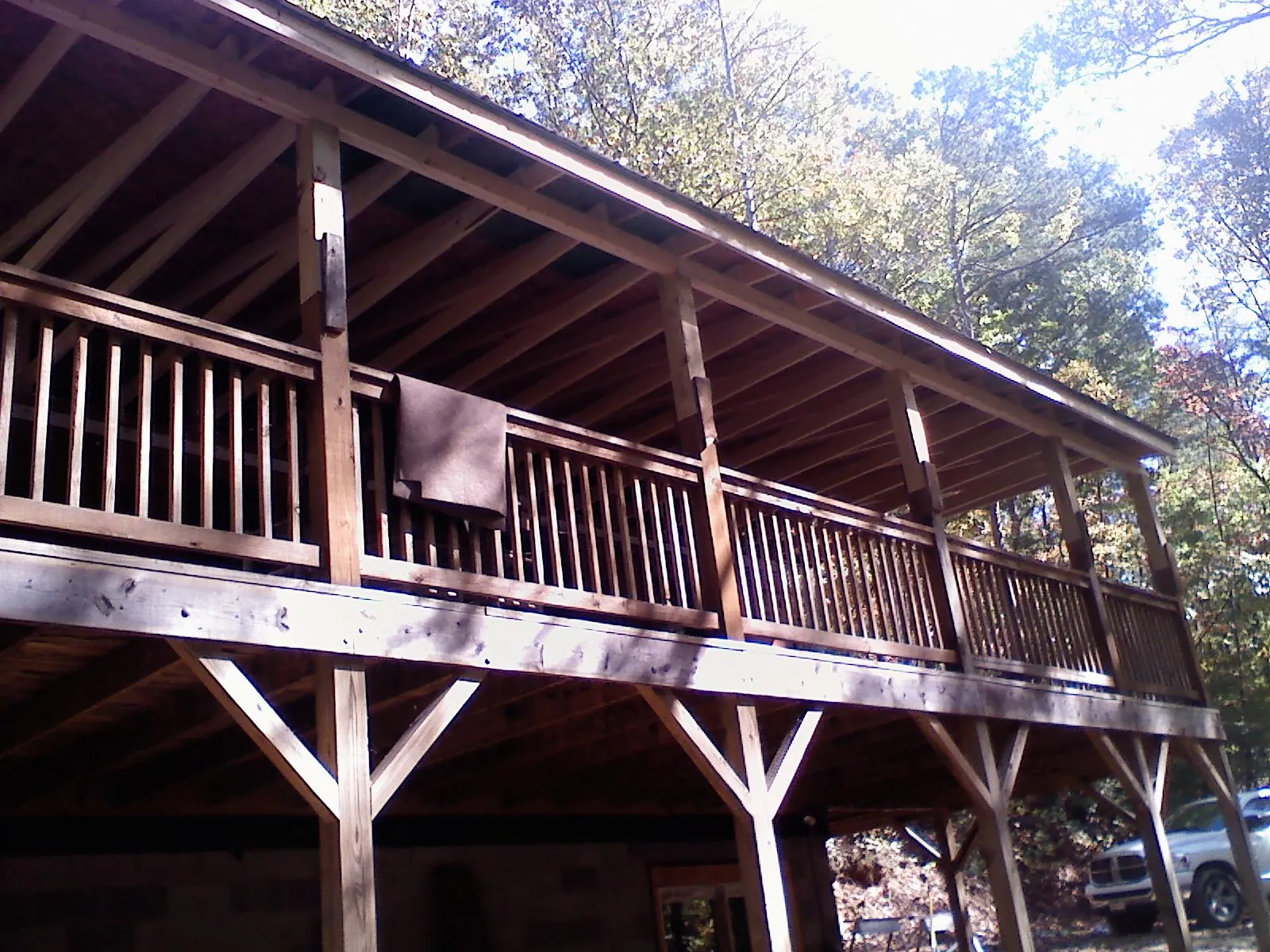 Timber framing under a new elevated porch and deck — Roof Leak Repair in Las Cruces by Roofing Brothers